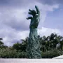 Holocaust Memorial sculpture in Miami Beach with a towering bronze cluster of human figures and surrounding statues