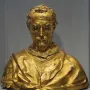Saint Rossore Reliquary, a gold-toned bust of a bearded man with ornate hair and draped clothing.