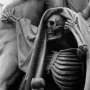 Skeletal figure from the Nelson Monument with a raised hand and flowing drapery beside a muscular form.