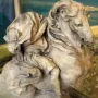 The Vision of Constantine sculpture depicted as a light-colored horse and rider with the rider’s head shrouded in drapery.
