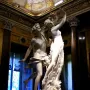 Bernini’s Apollo and Daphne marble sculpture showing Apollo lunging toward Daphne as she transforms into a tree.