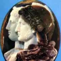 Gonzaga Cameo showing two carved profiles facing right in layered stone.