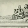 Sarcophagus of the Spouses showing a reclining Etruscan man and woman with gentle smiles and outstretched hands.