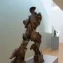 Unique Forms of Continuity in Space bronze sculpture of a striding human figure