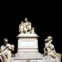 The Monument to Nicola Demidoff, a white marble memorial with a seated central figure and smaller figures around the base.