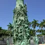 Holocaust Memorial sculpture in Miami Beach with a towering bronze cluster of human figures and surrounding statues