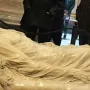 Veiled Christ marble sculpture with a translucent carved veil over a recumbent figure