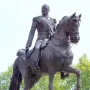 General Espartero Monument showing a bronze equestrian statue of a military figure on a horse atop a stone pedestal.