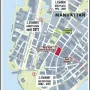 Map of lower Manhattan showing three numbered locations and landmarks including Wall Street, the New York Stock Exchange, and Zuccotti Park.