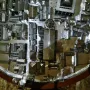 Gioiello di Vicenza shown as a circular miniature architectural model with many small metallic buildings and structures.