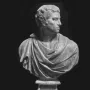 Michelangelo\'s Brutus in marble, shown as a bust with the head turned to the right.