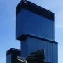 Silesian Insurgents\' Monument in front of modern glass skyscrapers in Katowice