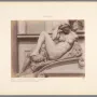 Michelangelo’s Night, a reclining nude marble figure with an owl and mask on the base.