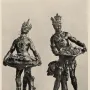 Moor with Emerald Plate sculpture showing a crowned figure with ornate jewelry holding a large tray above a rock-like base.