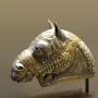 Sassanian horse head sculpture in gilded silver with detailed decorative patterns