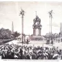 Crowd gathered around the Monument to Isabella of Castile during a public ceremony, with an equestrian statue on a tall pedestal and flags nearby.