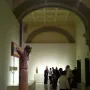 Batlló Majesty, a painted wooden Christ sculpture on a white display base.