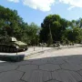 Battle of the Dnieper Diorama with a tank and artillery pieces on raised platforms.