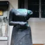 Headless Napir-Asu statue with a decorated skirt and clasped hands