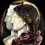 Gonzaga Cameo showing two carved profiles facing right in layered stone.