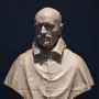 Marble bust of Cardinal Alessandro Peretti, showing a balding man with a mustache and small beard.