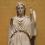 Apollo Barberini marble statue standing in a flowing robe and holding a lyre