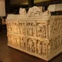 The Sarcophagus of Junius Bassus with two tiers of carved figures in arched architectural panels.
