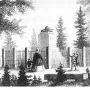 Napoleonstein stone pillar topped with a bicorne hat, enclosed by a fence and surrounded by trees, with several people standing nearby.