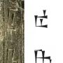 Close-up of the Iddi-Ilum statuette showing deeply carved cuneiform script on a weathered stone surface.
