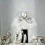 Cenotaph of Archduchess Maria Christina with a white marble pyramid-shaped monument and classical mourning figures.