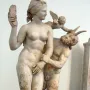 Aphrodite, Pan and Eros sculpture in the National Archaeological Museum in Athens.