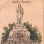 Schiller Monument with a standing figure on a pedestal, flanked by two seated allegorical figures behind an iron fence.