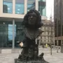 Betty Campbell statue in Cardiff, a bronze monument with a bust of a woman above children reading around the base.
