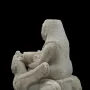 Lady of Galera seated stone figurine holding a bowl, flanked by winged creatures