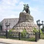 Monument to Bohdan Khmelnytsky, a bronze equestrian statue on a tiered stone pedestal with vines.