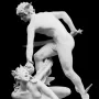 Perseus and the Gorgon marble sculpture showing Perseus poised to strike Medusa, who lies prone with snakes in her hair and a sword raised.
