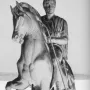 Prince Józef Poniatowski Monument, a bronze equestrian statue of a cloaked rider on a rearing horse atop a tall pedestal.