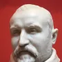White marble bust of Carlo Antonio del Pozzo with a trimmed beard and mustache, shown on a tiered pedestal.