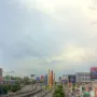 Torres de Satélite colorful towers rising beside a busy multi-lane highway.