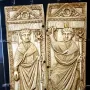 Diptych of Boethius with two carved ivory panels showing robed male figures holding staffs.