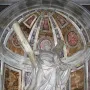 Statue of Saint Andrew in a vaulted niche with marble and gold accents.