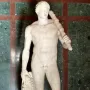 Lansdowne Heracles, a nude marble statue of a muscular beardless man holding a club and lion skin.