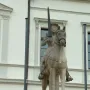 Haldensleben Roland statue of a crowned figure holding a sword while mounted on a horse.